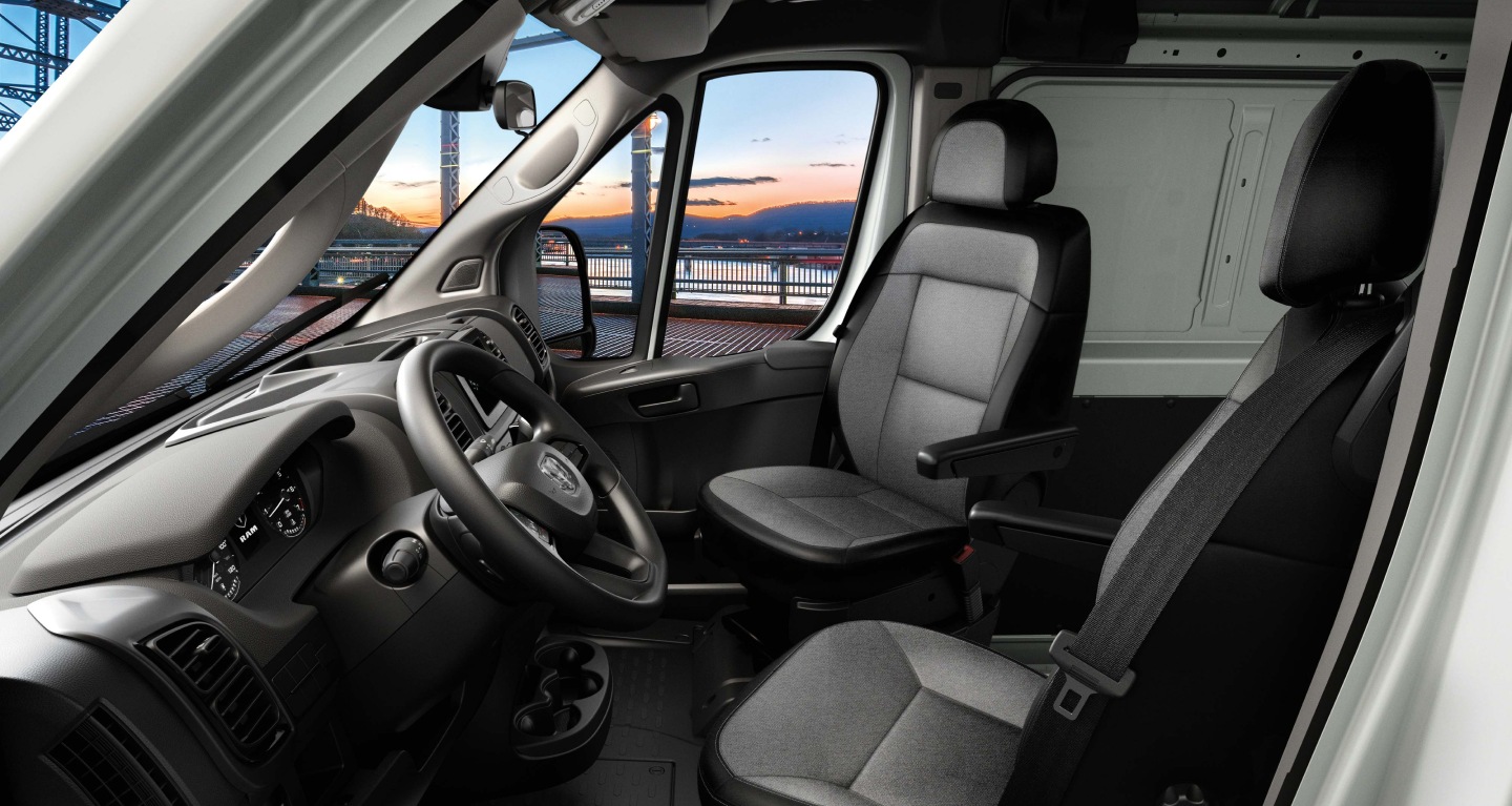 Display The front swivel bucket seats in the 2027 Ram ProMaster Cargo Van.