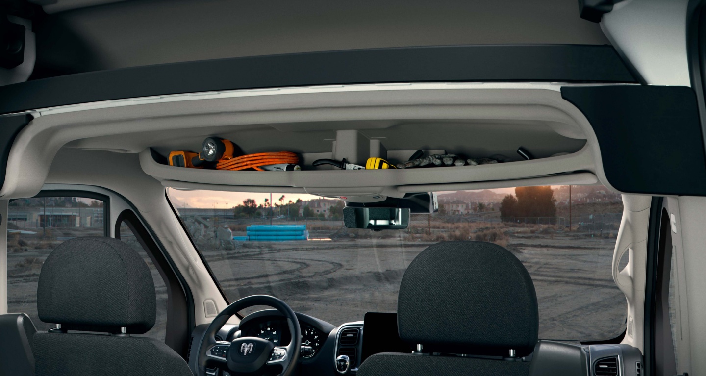Display The windshield and full-length headliner storage compartment in the 2027 Ram ProMaster Cargo Van.